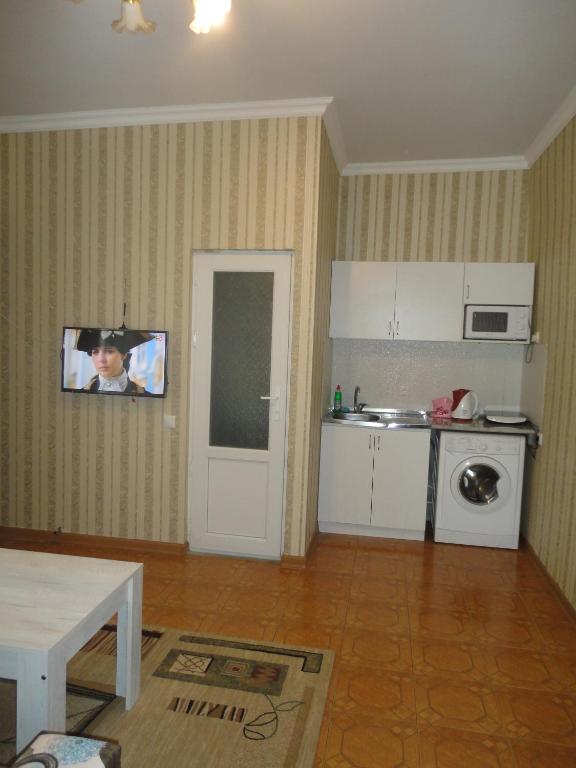 Kuchyň nebo kuchyňský kout v ubytování Like Home Guesthouse & Tours