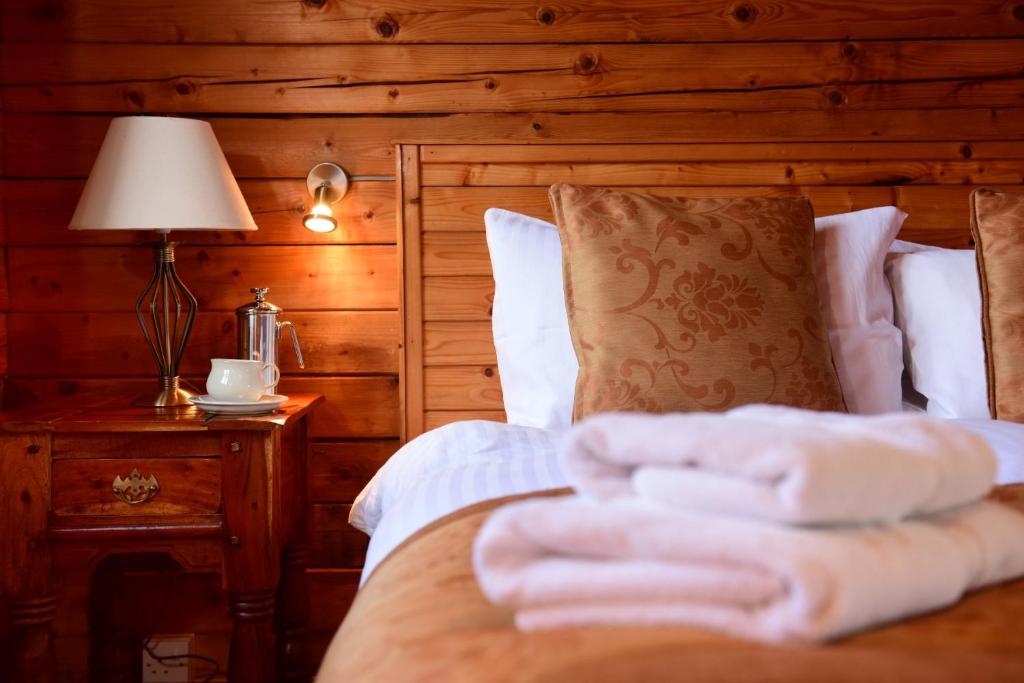 Postel nebo postele na pokoji v ubytování Leny Estate