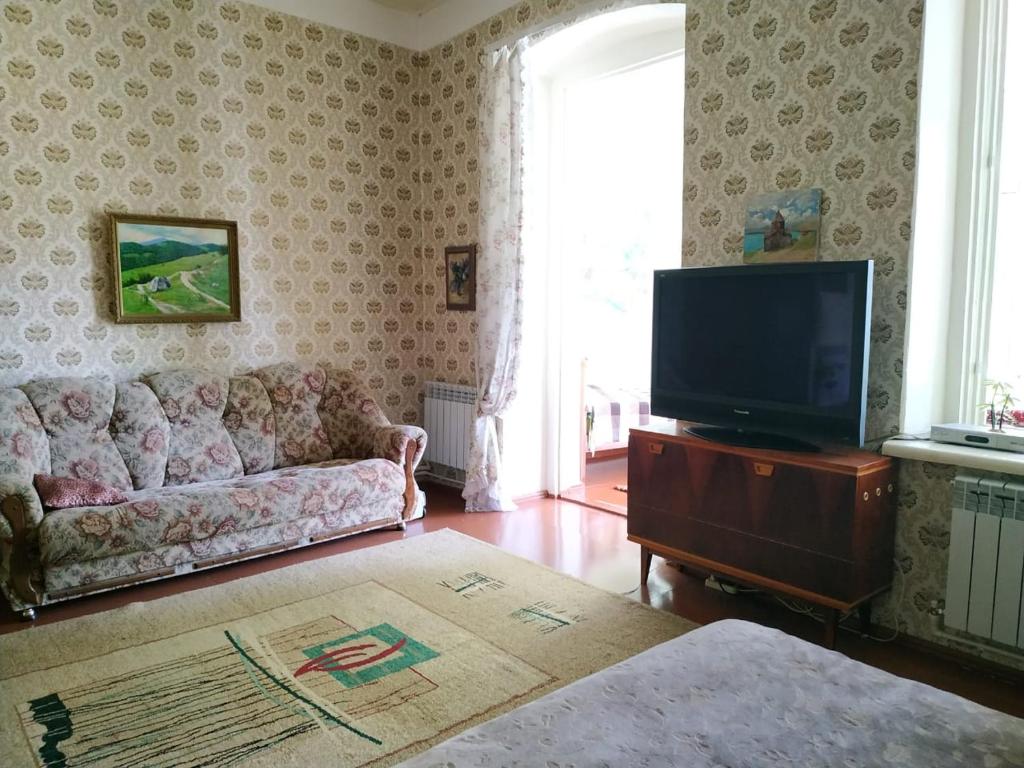 TV a/nebo společenská místnost v ubytování Sweet Home