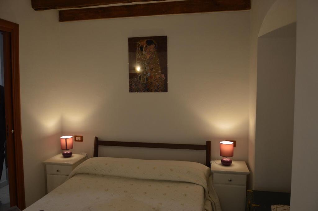 En eller flere senge i et værelse på Posizione_Strategica_SottoSopra_LaSpezia