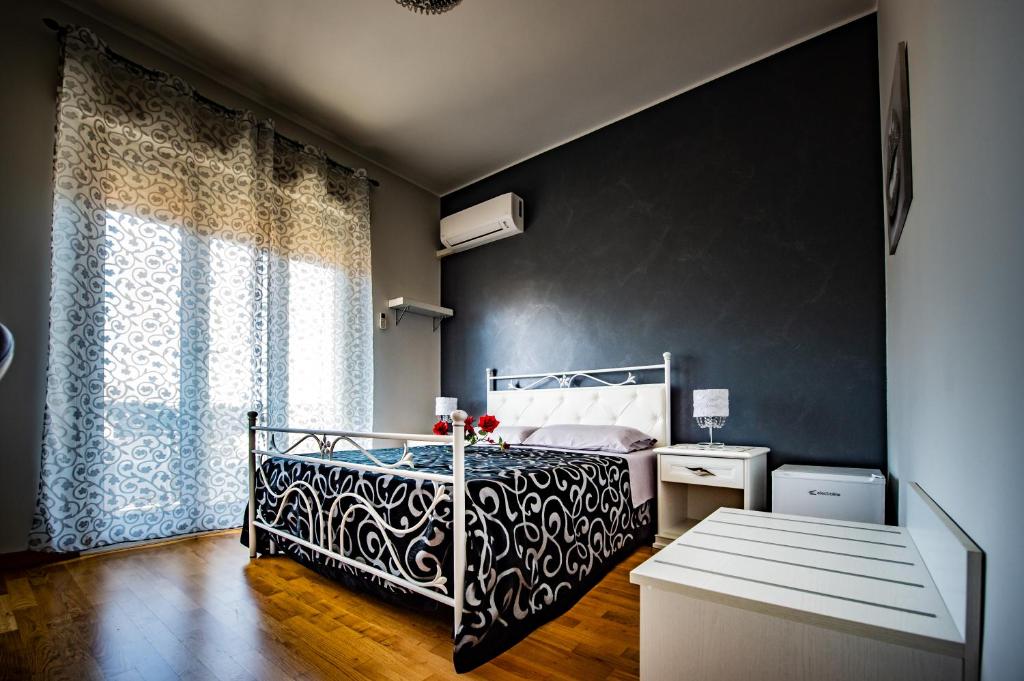 Postel nebo postele na pokoji v ubytování BnB Cheope