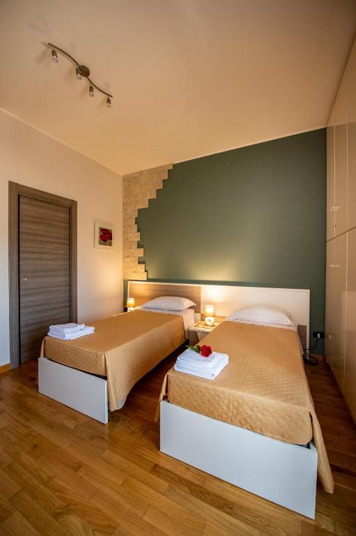 Postel nebo postele na pokoji v ubytování BnB Cheope