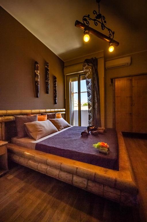 Postel nebo postele na pokoji v ubytování BnB Cheope