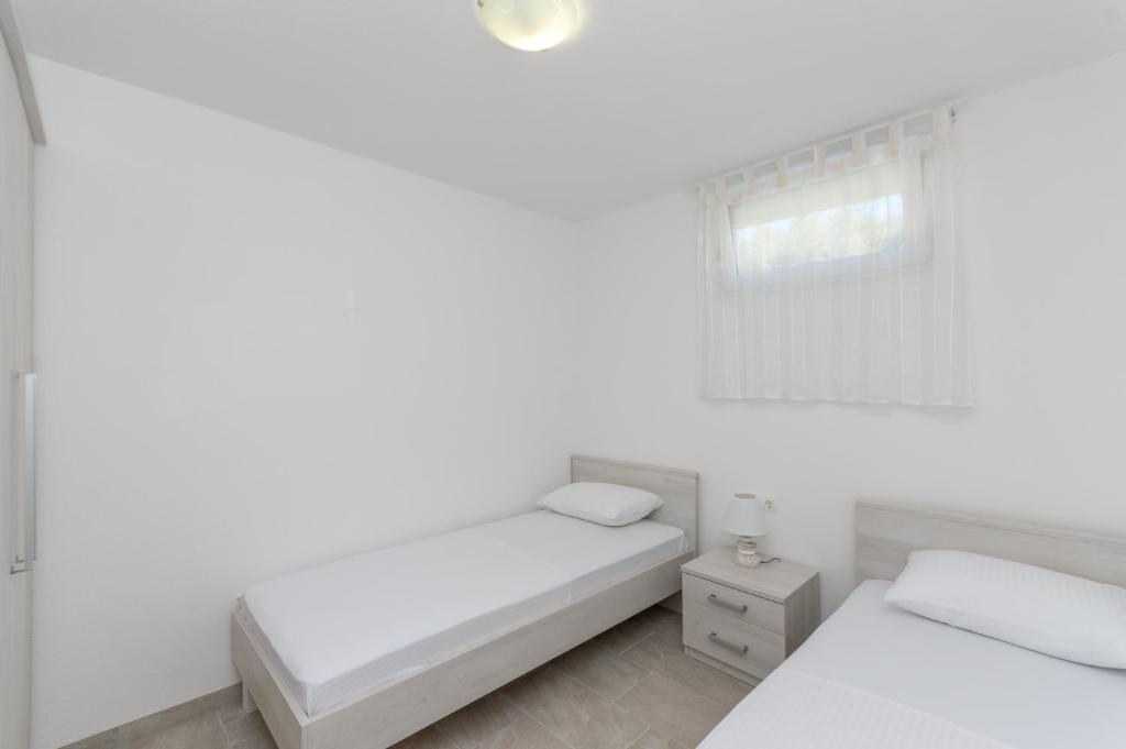Posteľ alebo postele v izbe v ubytovaní Villa Ivan