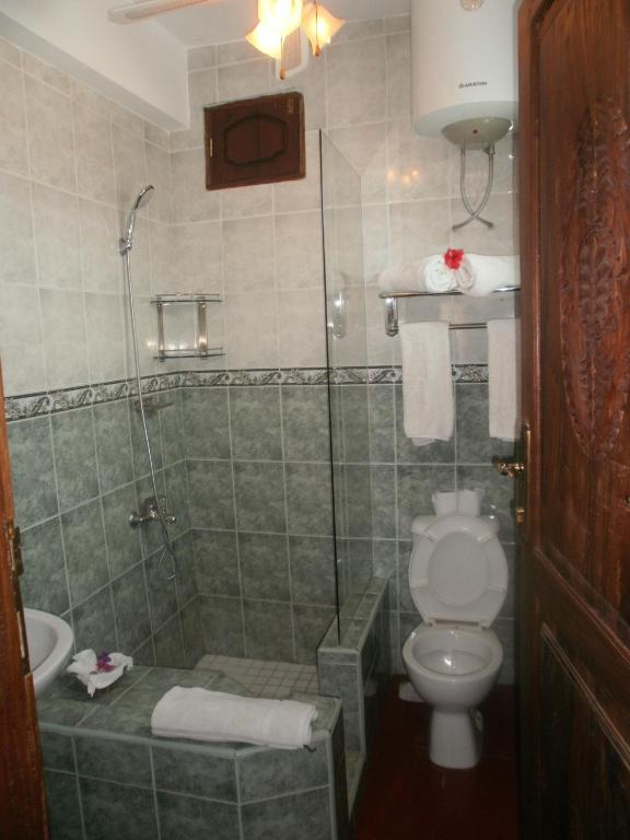Koupelna v ubytování Asmini Palace Hotel