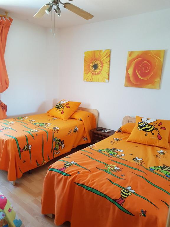 Postel nebo postele na pokoji v ubytování Apartamento frente al mar
