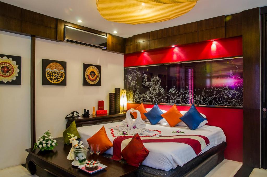 Postel nebo postele na pokoji v ubytování Kirikayan Boutique Resort - SHA Extra Plus