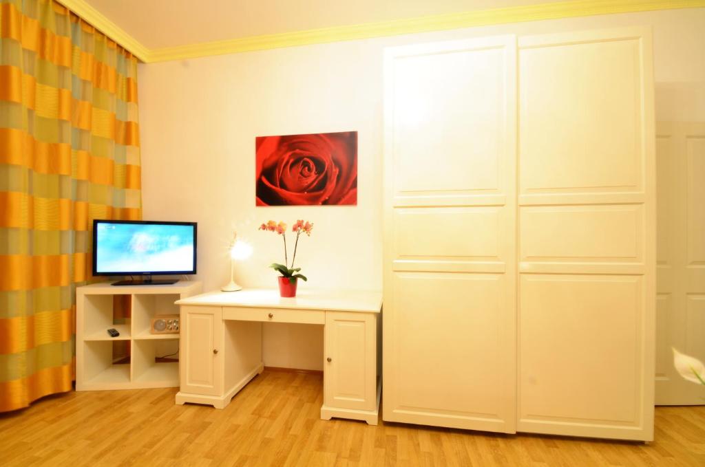 TV o dispositivi per l'intrattenimento presso AJO Apartments - Messe City Flat - Self-Check-in
