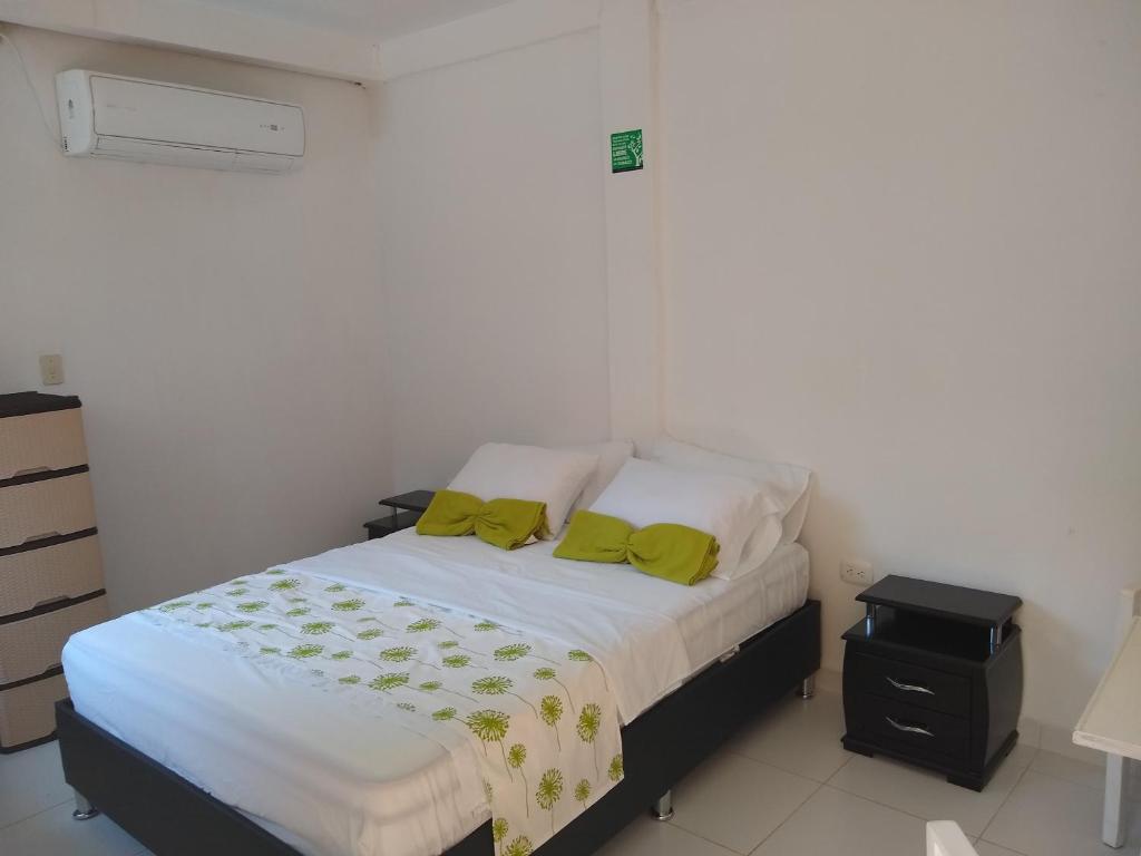Voodi või voodid majutusasutuse Hostal Palohe Taganga toas