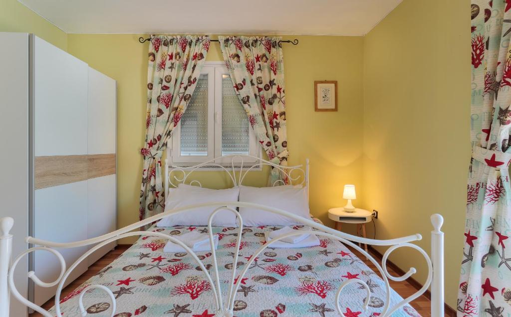 Postel nebo postele na pokoji v ubytování Apartments Dora Victoria Dream