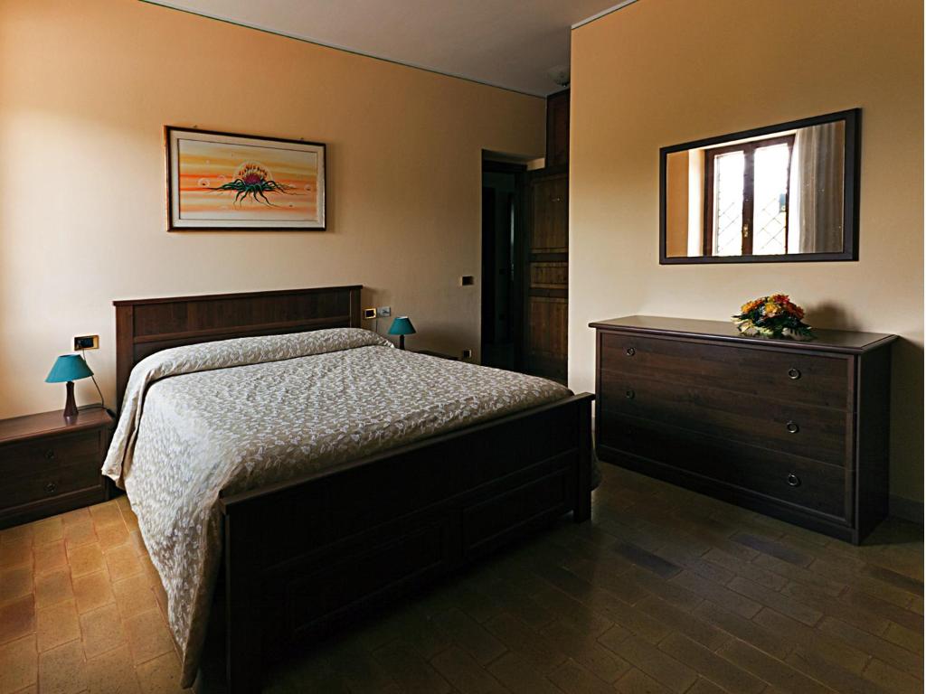 Postel nebo postele na pokoji v ubytování B&B Colle San Francesco