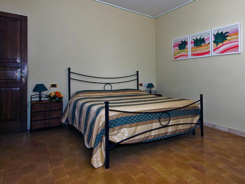 Postel nebo postele na pokoji v ubytování B&B Colle San Francesco