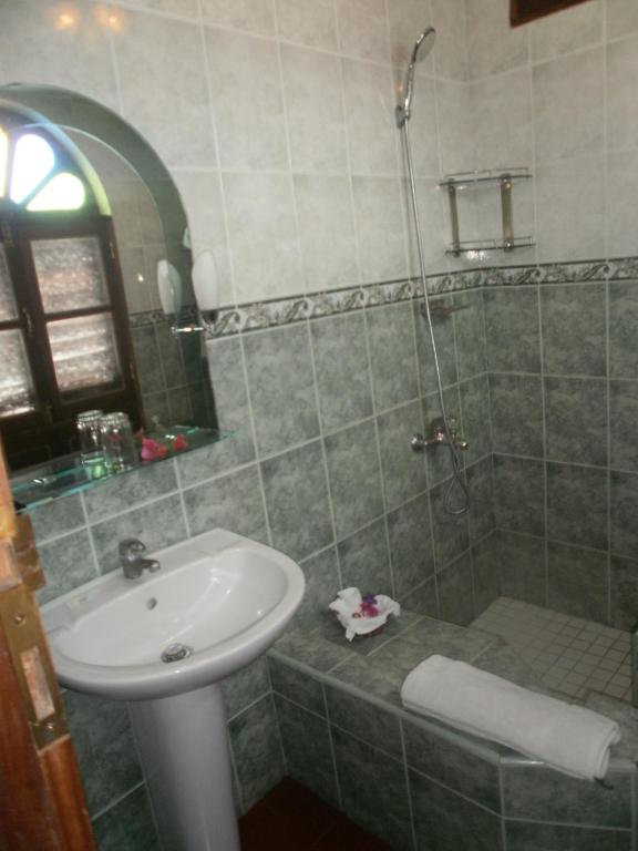 Koupelna v ubytování Asmini Palace Hotel