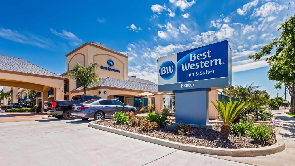 a sign in front of a best western inn suites at Best Western Exeter Inn & Suites in Exeter