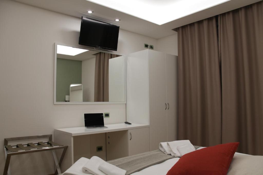 TV a/nebo společenská místnost v ubytování Albergo Da Benedetta