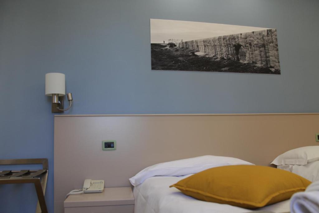 Postel nebo postele na pokoji v ubytování Albergo Da Benedetta