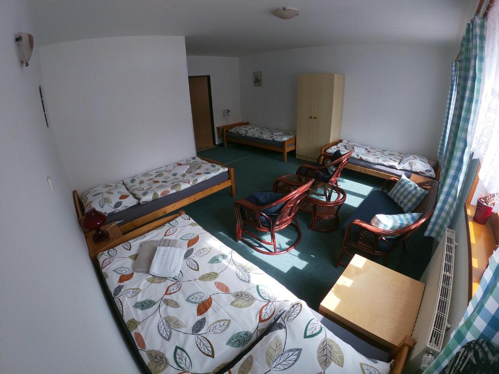 Postel nebo postele na pokoji v ubytování Pension Ferda