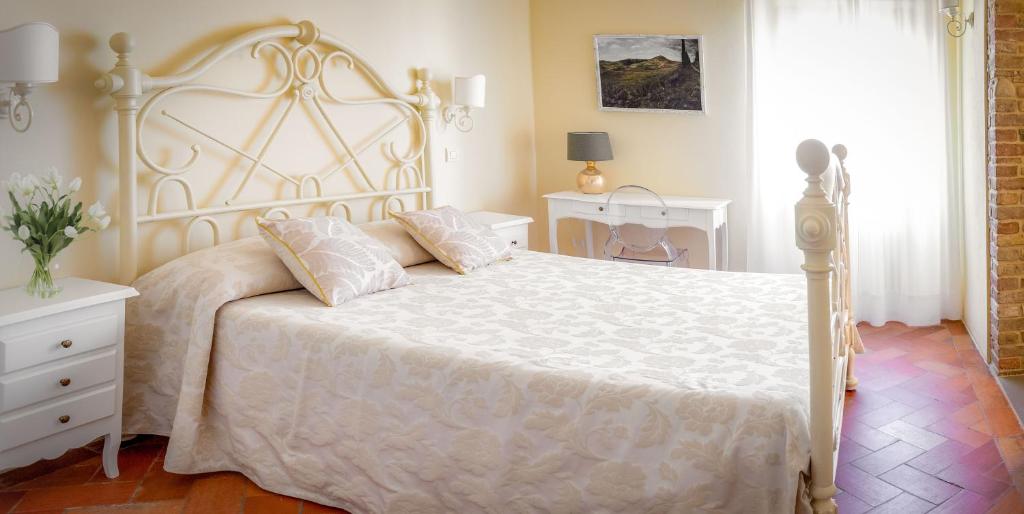 Postel nebo postele na pokoji v ubytování Hotel Il Castello