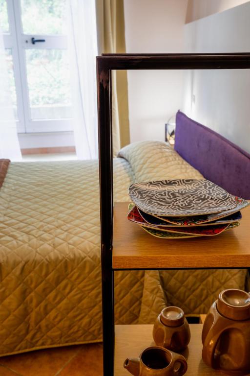 Postel nebo postele na pokoji v ubytování Bed&Book
