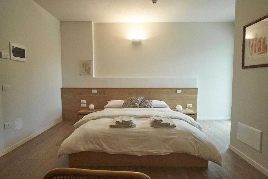 Postel nebo postele na pokoji v ubytování Agriturismo CasaMela