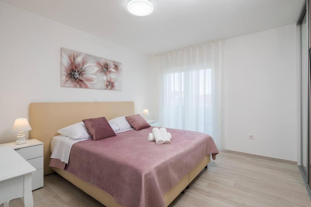 Posteľ alebo postele v izbe v ubytovaní Apartment Apollo 3