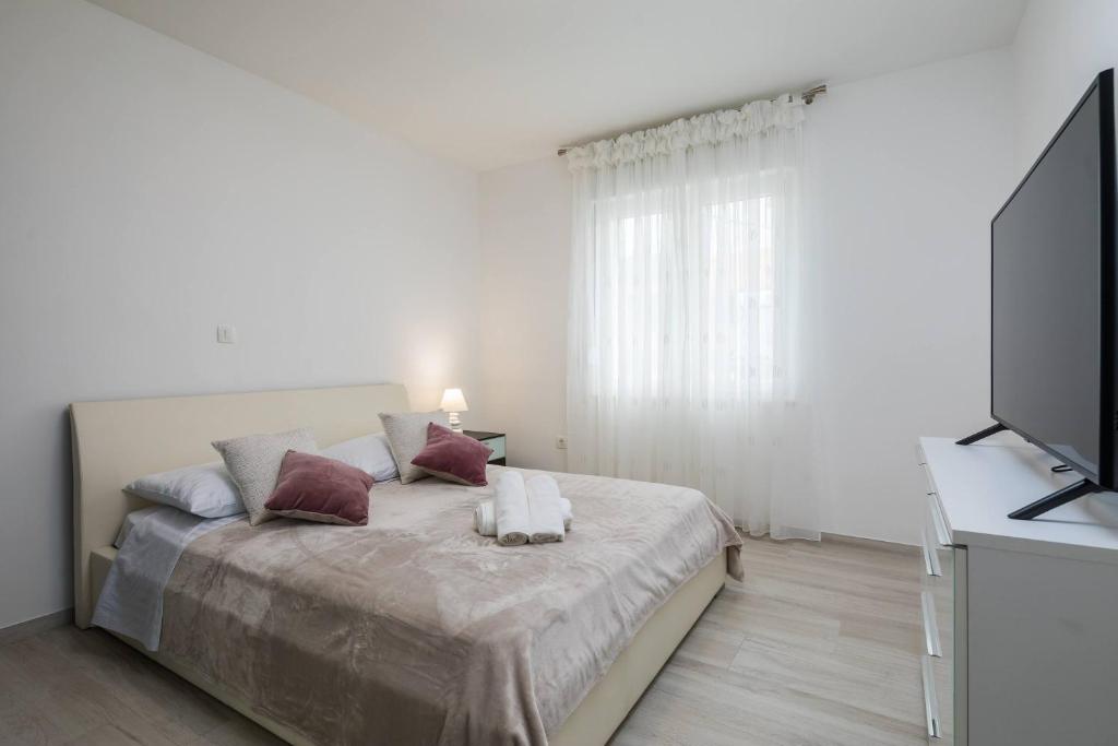 Posteľ alebo postele v izbe v ubytovaní Apartment Apollo 3
