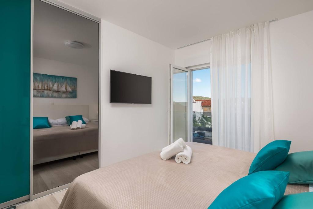 Televízia a/alebo spoločenská miestnosť v ubytovaní Apartment Apollo 3