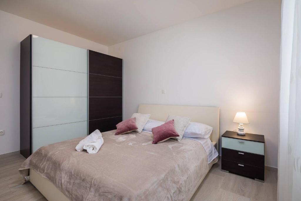 Posteľ alebo postele v izbe v ubytovaní Apartment Apollo 3
