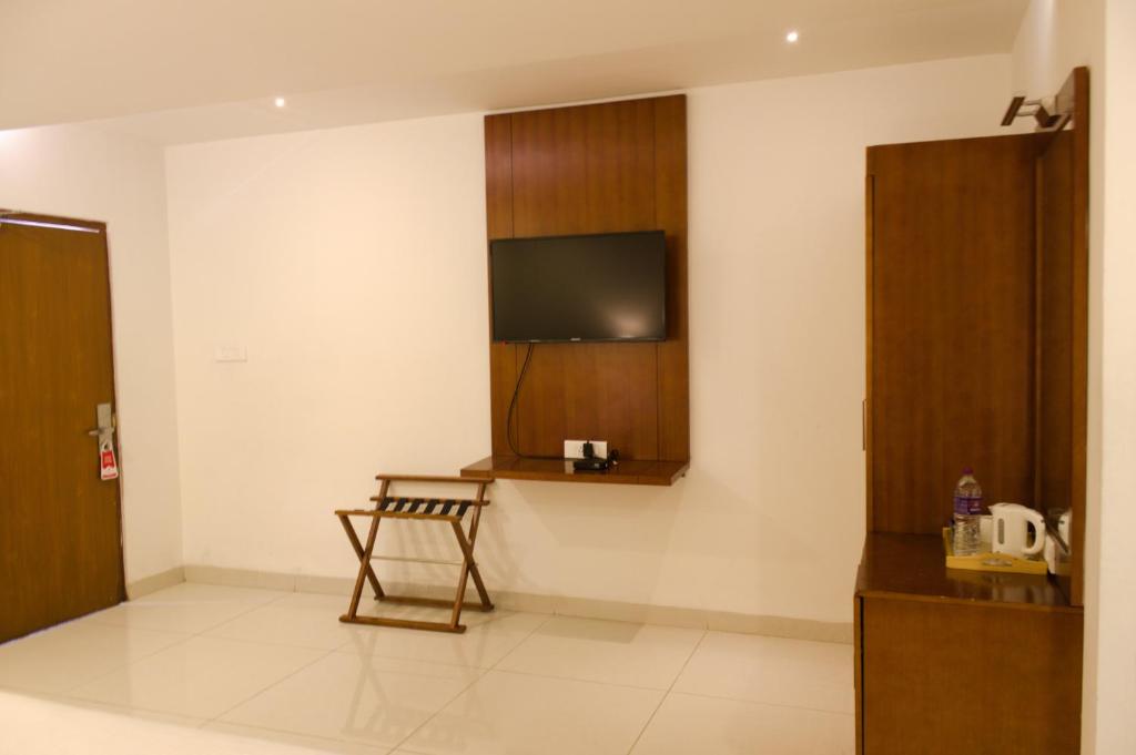 TV a/nebo společenská místnost v ubytování Mrugavani Resort & Spa