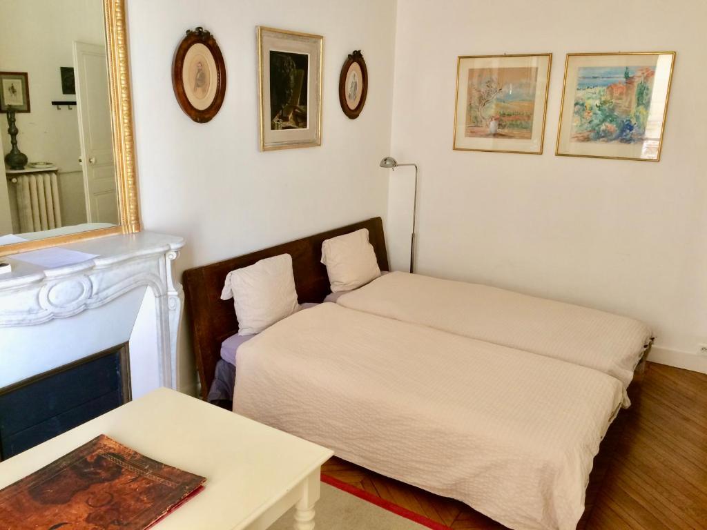 Postel nebo postele na pokoji v ubytování Charming bedroom