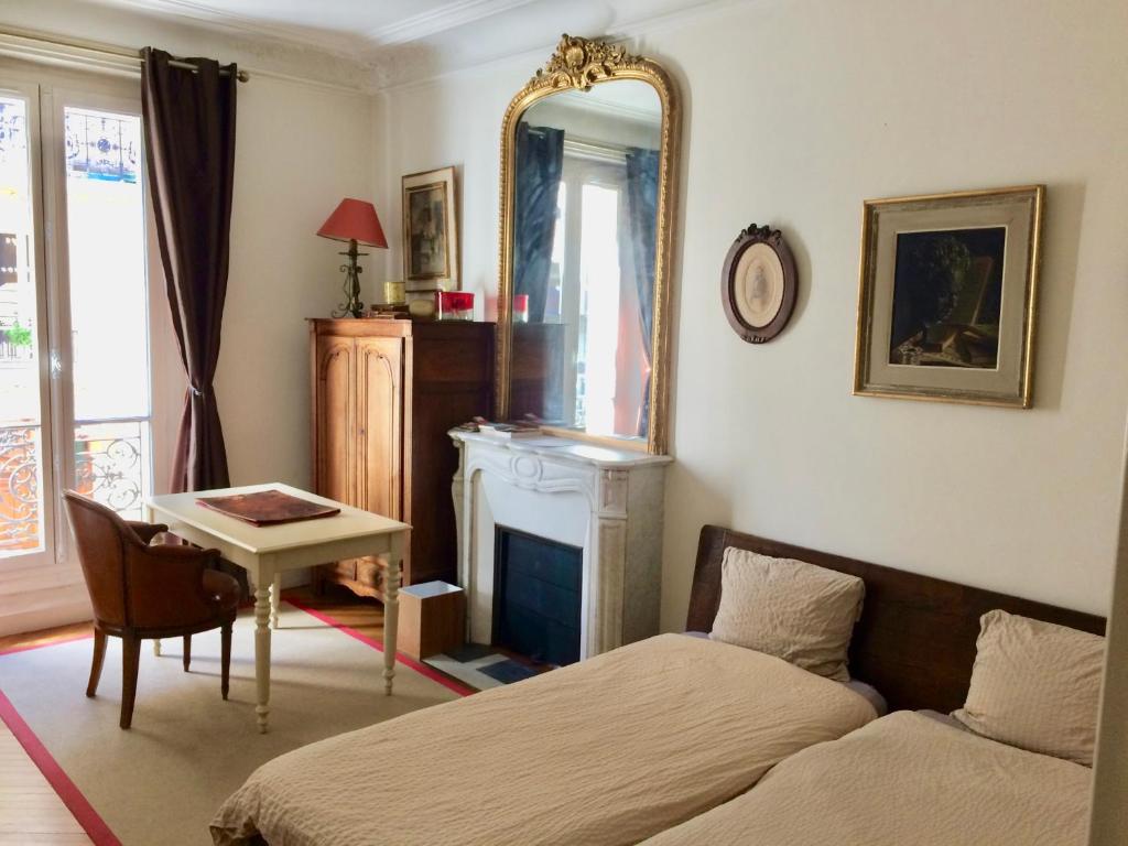 Postel nebo postele na pokoji v ubytování Charming bedroom