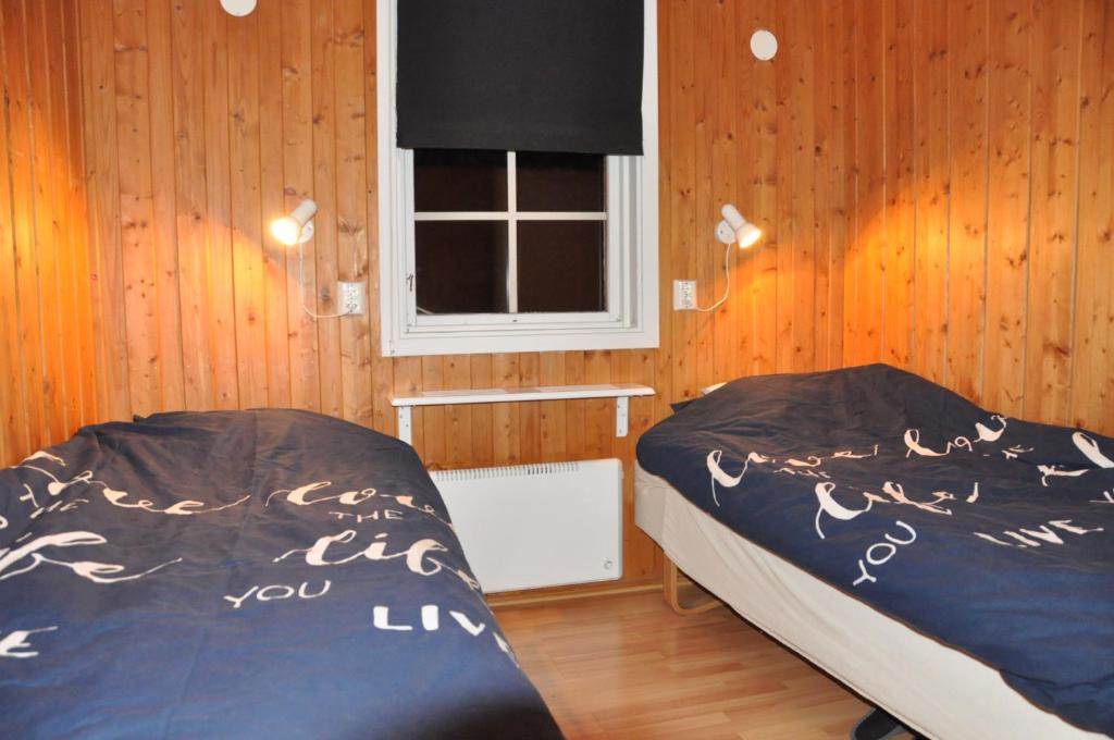 Postel nebo postele na pokoji v ubytování Stuga 5 Varmland