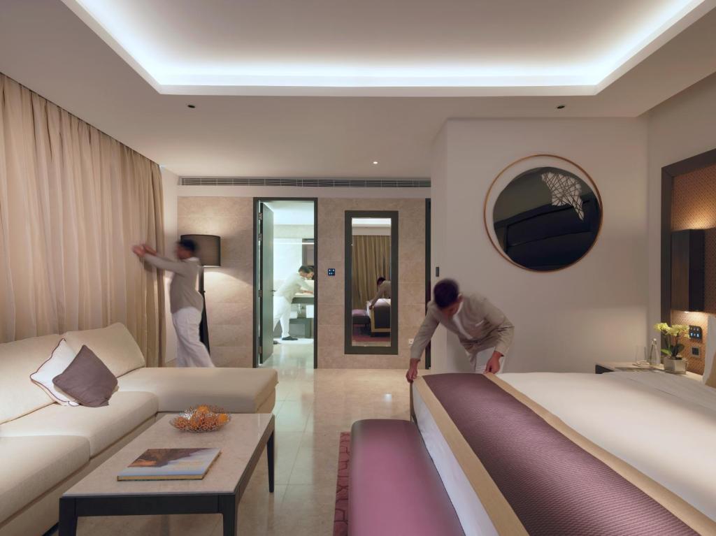 Postel nebo postele na pokoji v ubytování Kempinski Hotel Muscat
