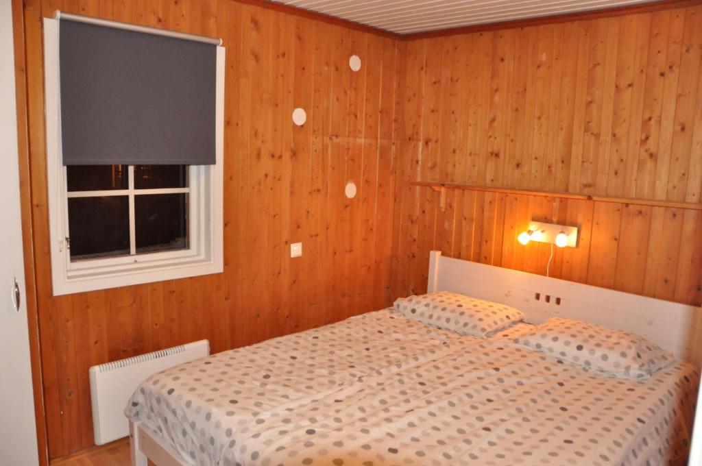Postel nebo postele na pokoji v ubytování Stuga 5 Varmland