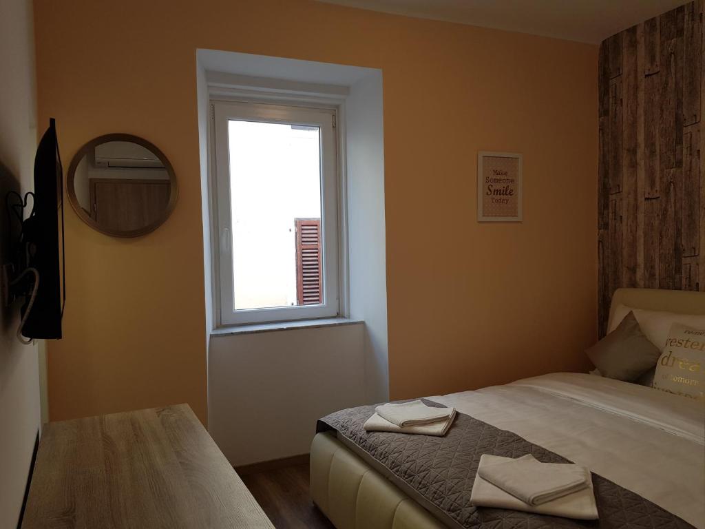 Letto o letti in una camera di Piraneska