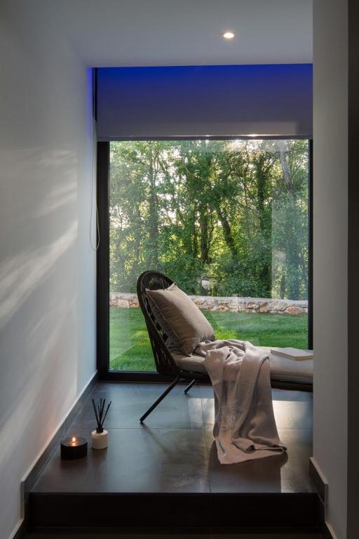 Część wypoczynkowa w obiekcie Modern Villa 55 with Pool and Spa