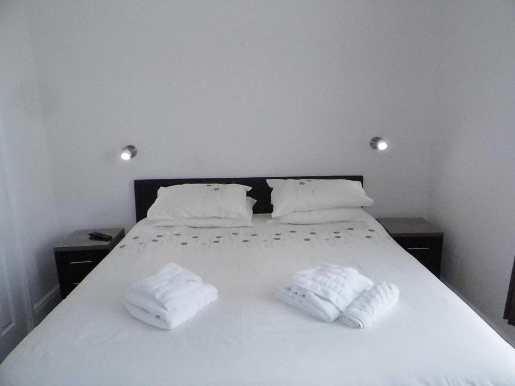Postel nebo postele na pokoji v ubytování The Kerswell Hotel