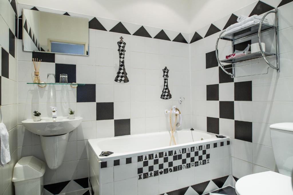 Koupelna v ubytování Hotel Dejmalik