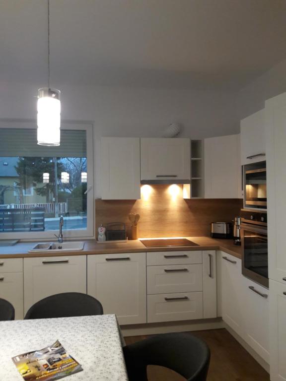 Kuchyň nebo kuchyňský kout v ubytování Margareta Home