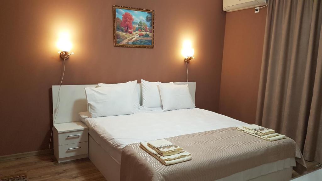 Postel nebo postele na pokoji v ubytování MARIANA - guest rooms