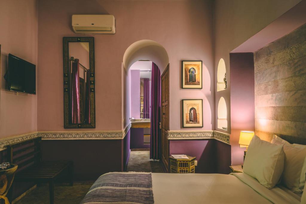 Postel nebo postele na pokoji v ubytování Riad Enchanté