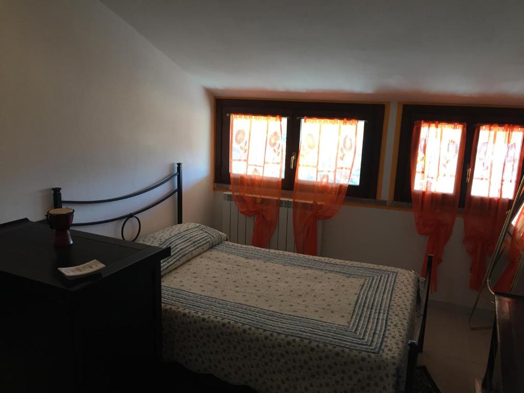 Katil atau katil-katil dalam bilik di B&B Vìlla Ragno