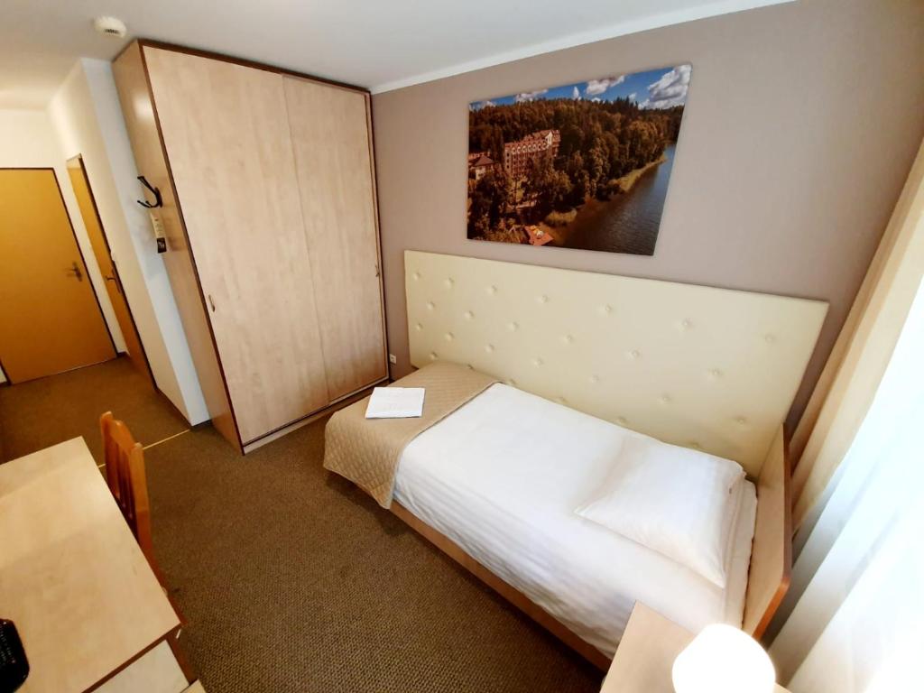 Posteľ alebo postele v izbe v ubytovaní Hotel Mazuria Country & SPA