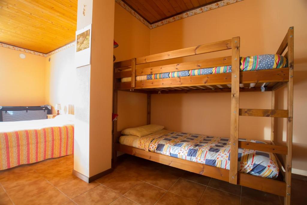 Posteľ alebo postele v izbe v ubytovaní Guest House Il Nido dello Svasso -Foresteria Lombarda-