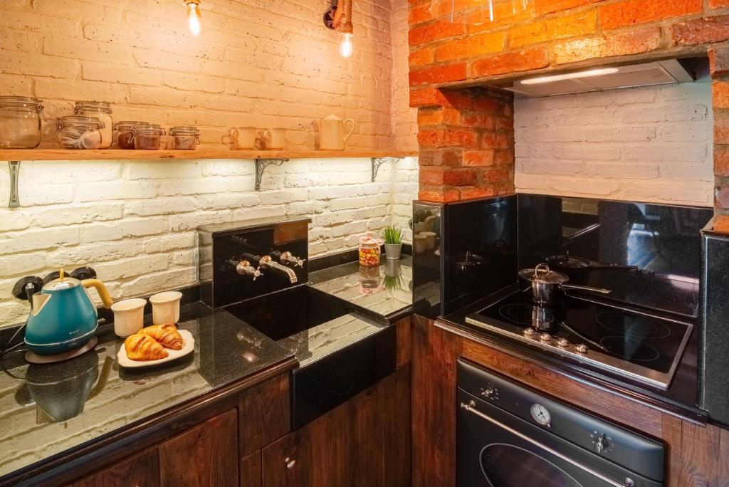 Kuchyň nebo kuchyňský kout v ubytování Apartament dwupoziomowy Hanka VIP Wisła
