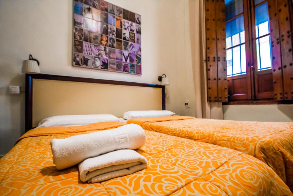 A bed or beds in a room at Nuevo Suizo