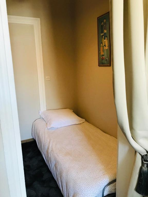 Postel nebo postele na pokoji v ubytování La bohème - Chambres d’hôtes