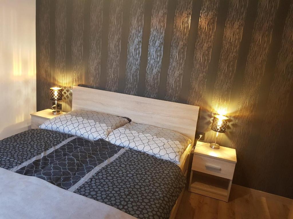 Postel nebo postele na pokoji v ubytování Margareta Home