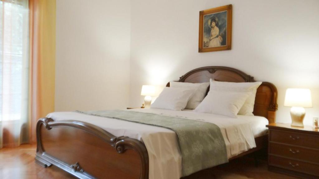 Posteľ alebo postele v izbe v ubytovaní Apartman Magasic