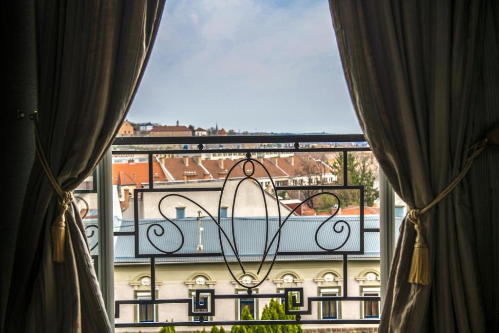 Balkón nebo terasa v ubytování Erla Villa Boutique Hotel